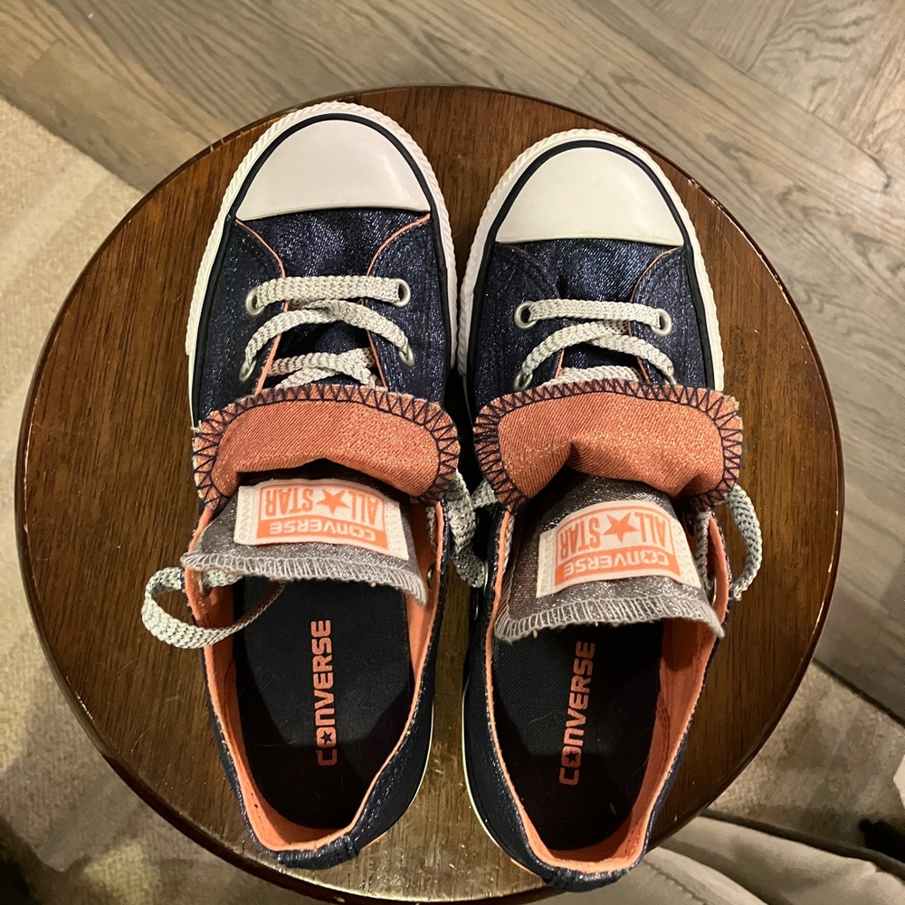 WORN INSIDE ONCE. Converse with glitter and pink highlights on blue sneaker.